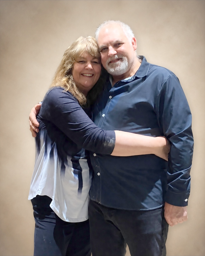 Dr. Constance Santego embraces her husband, Nicholas Brummet.